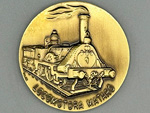 Medalla conmemorativa del 175 aniversario del tren Barcelona-Matar (Insignies Pujol, Barcelona, 2023) - Donacin: Crculo Histrico Miguel Biada / 123 Innovation Group, SL - Pieza IG: 08153